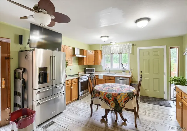4th image of 1540 S Wolcott Ct, Denver, CO 80219 | MLS# 7579646