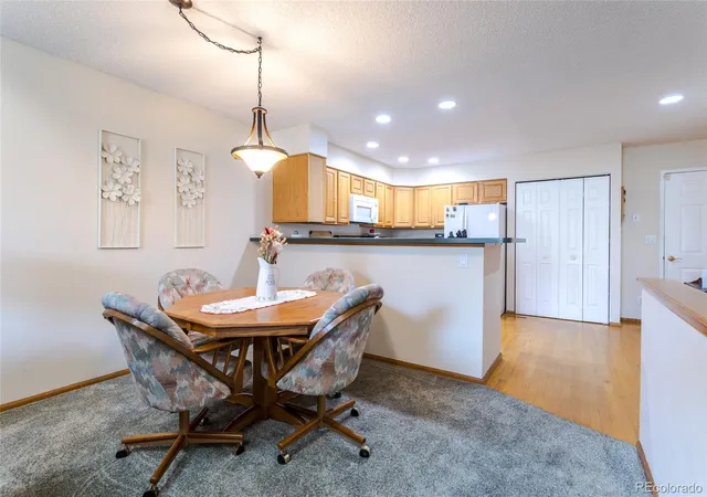 Photo 3 of Townhouse for sale at 5727 W Asbury Pl, Lakewood, CO 80227 | MLS# 2643801 | Listing updated on 2026-08-06