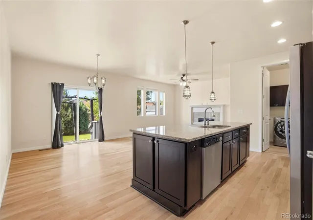 4th image of 15952 Village Cir, Commerce City, CO 80603 | MLS# 7606985