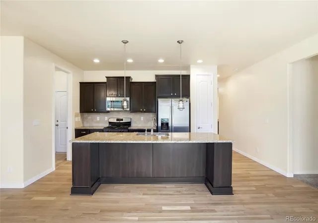 5th image of 15952 Village Cir, Commerce City, CO 80603 | MLS# 7606985