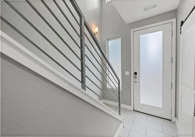 Photo 3 of Townhouse for sale at 2211 Eliot St, Denver, CO 80211 | MLS# 9483931 | Listing updated on 2026-09-21
