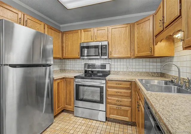 Photo 1 of Condo for sale at 13500 E Cornell Ave #205, Aurora, CO 80014 | MLS# 5493259 | Listing updated on 2026-07-06