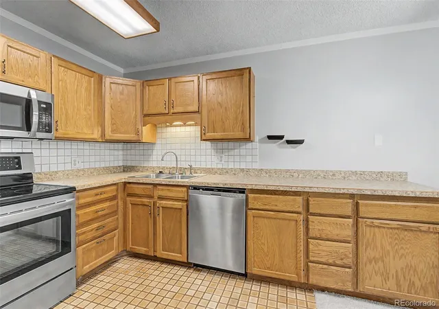 Photo 2 of Condo for sale at 13500 E Cornell Ave #205, Aurora, CO 80014 | MLS# 5493259 | Listing updated on 2026-07-06