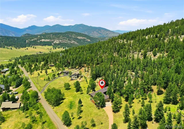 Photo 4 of Single family home for sale at 32042 Horseshoe Dr, Evergreen, CO 80439 | MLS# 7009087 | Listing updated on 2026-09-26