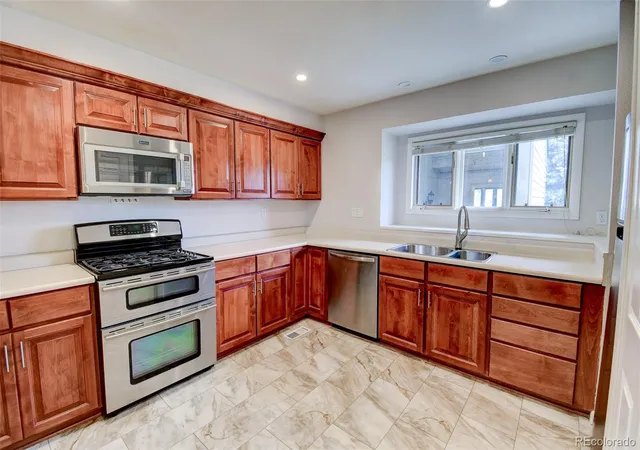 Listing Photo 4 - Condo for sale in building located at 7857 S University Wy, Centennial, CO 80122
