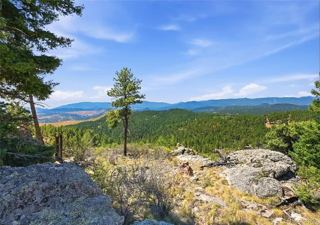 Photo 1 of Land for sale at 33550 Mount Wilson Rd, Pine, CO 80470 | MLS# 4240160 | Listing updated on 2026-07-24