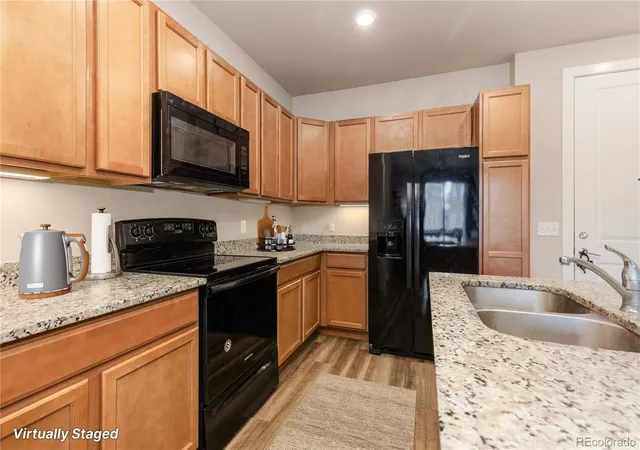 Photo 3 of Condo for sale at 14341 E Tennessee Ave #103, Aurora, CO 80012 | MLS# 5113637 | Listing updated on 2026-10-07