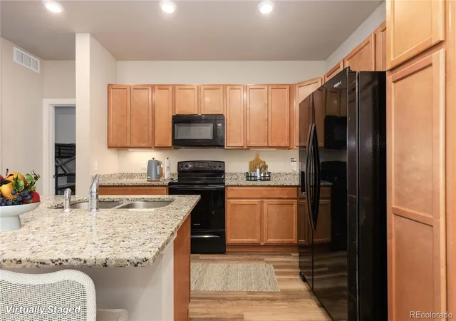 Photo 4 of Condo for sale at 14341 E Tennessee Ave #103, Aurora, CO 80012 | MLS# 5113637 | Listing updated on 2026-10-07