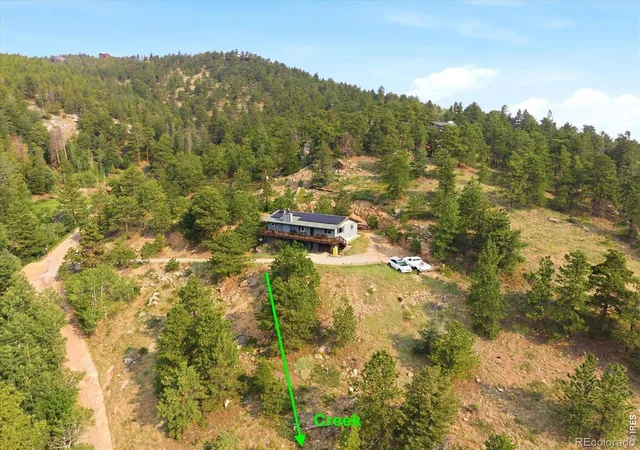 Photo 3 of Single family home for sale at 32307 Sylvan Rd, Golden, CO 80403 | MLS# IR1063612 | Listing updated on 2026-10-10