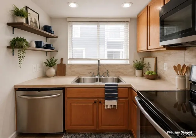 Listing Photo 2 - Condo for sale in building located at 6545 W 84th Wy, Arvada, CO 80003 - Unit #122