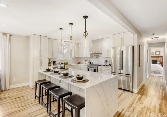 Photo 1 of Single family home for sale at 3111 S Holly Pl, Denver, CO 80222 | MLS# 3891613 | Listing updated on 2026-10-08