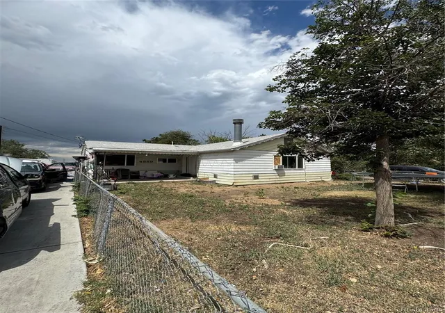 Photo 3 of Single family home for sale at 4889 W Tennessee Ave, Denver, CO 80219 | MLS# 8897346 | Listing updated on 2026-07-14