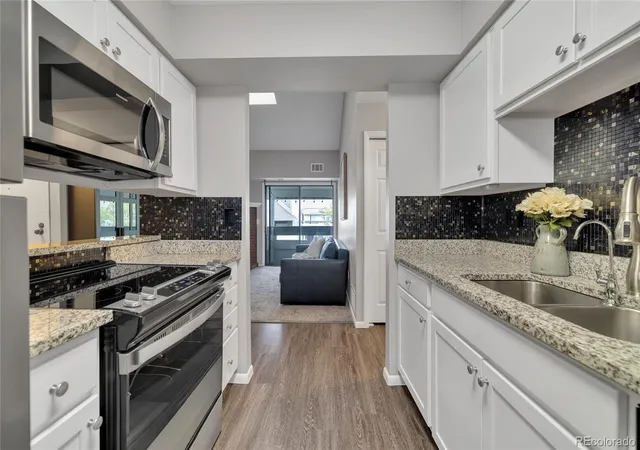 Listing Photo 5 - Condo for sale in building located at 14437 E 1st Dr, Aurora, CO 80011 - Unit #C04