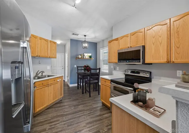 Photo 2 of Townhouse for sale at 9213 W Coco Pl, Littleton, CO 80128 | MLS# 5962892 | Listing updated on 2026-10-01