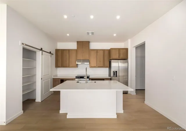 2nd image of 6153 N Ceylon St #106, Denver, CO 80249 | MLS# 3040473