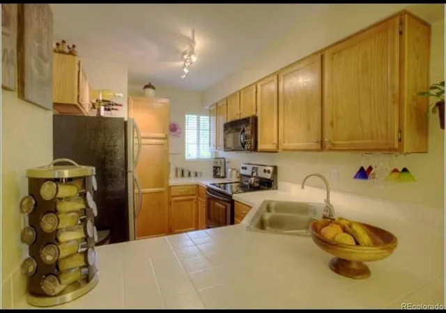 Photo 3 of Townhouse for sale at 1470 S Quebec Way #110, Denver, CO 80231 | MLS# 2823671 | Listing updated on 2026-09-04