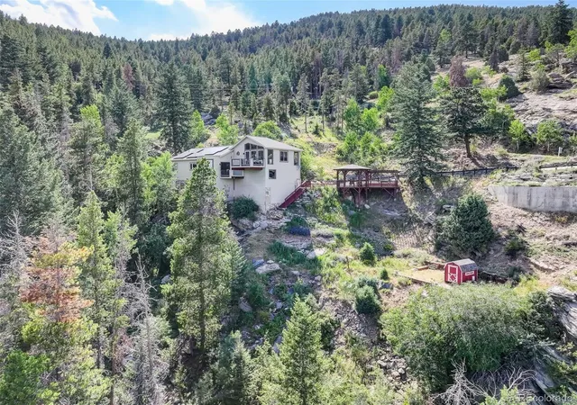 Photo 2 of Single family home for sale at 1255 Hy Vu Dr, Evergreen, CO 80439 | MLS# 7659332 | Listing updated on 2026-09-22