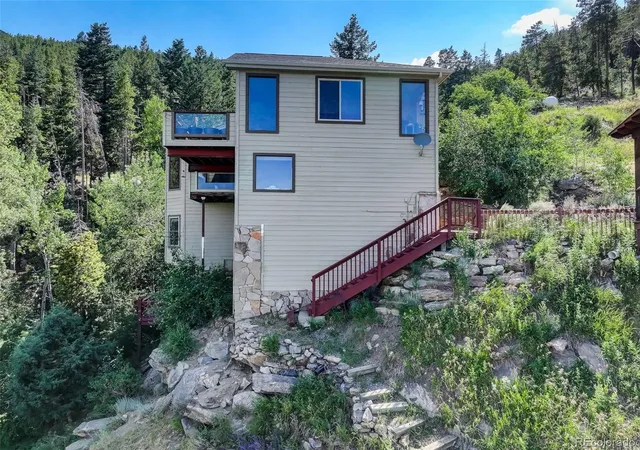 Photo 3 of Single family home for sale at 1255 Hy Vu Dr, Evergreen, CO 80439 | MLS# 7659332 | Listing updated on 2026-09-22