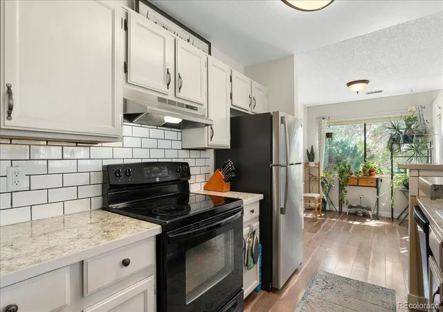 Listing Photo 5 - Condo for sale in building located at 5690 W 80th Pl, Arvada, CO 80003 - Unit #98