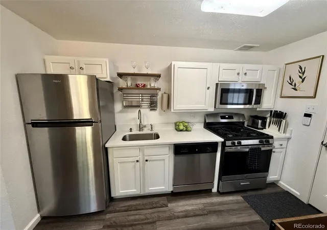 Photo 4 of Townhouse for sale at 1552 Trenton St, Denver, CO 80220 | MLS# 1519899 | Listing updated on 2026-08-27