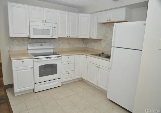 Photo 3 of Condo for sale at 1265 Colorado Blvd #9, Denver, CO 80206 | MLS# 4534344 | Listing updated on 2026-09-24