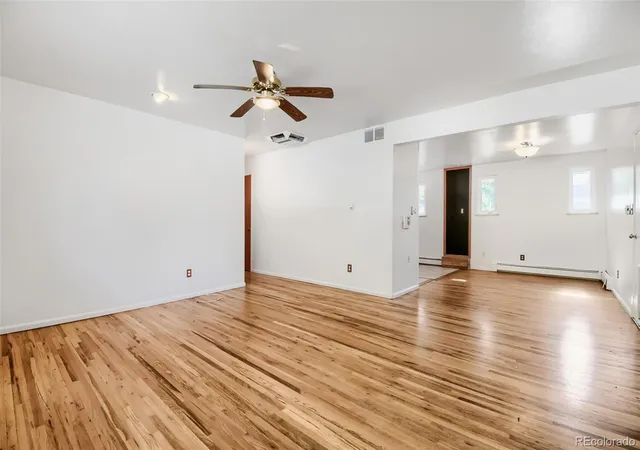 Photo 3 of Single family home for sale at 422 S Uvalda St, Aurora, CO 80012 | MLS# 6603545 | Listing updated on 2026-09-05