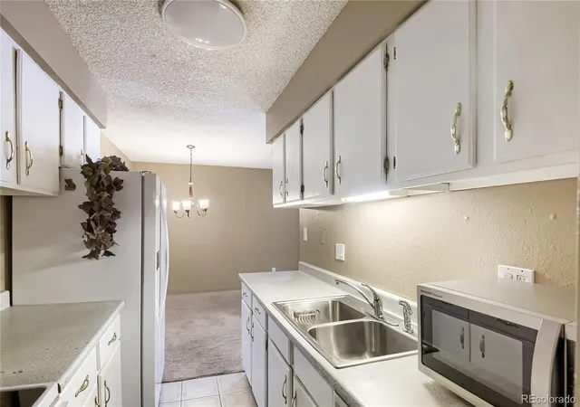 Photo 3 of Condo for sale at 7755 E Quincy Ave #201A1, Denver, CO 80237 | MLS# 7186399 | Listing updated on 2026-08-24