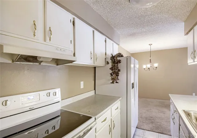 Photo 4 of Condo for sale at 7755 E Quincy Ave #201A1, Denver, CO 80237 | MLS# 7186399 | Listing updated on 2026-08-24