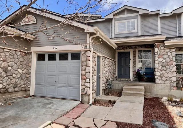Photo 1 of Townhouse for sale at 9311 Welby Rd, Thornton, CO 80229 | MLS# 7623776 | Listing updated on 2026-08-31