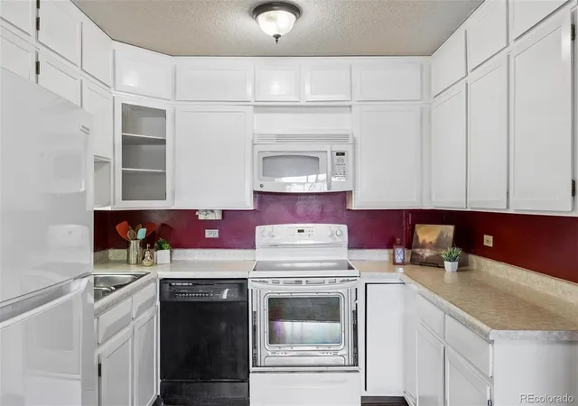 Photo 3 of Condo for sale at 9150 E Center Ave #4B, Denver, CO 80247 | MLS# 9198399 | Listing updated on 2026-07-24