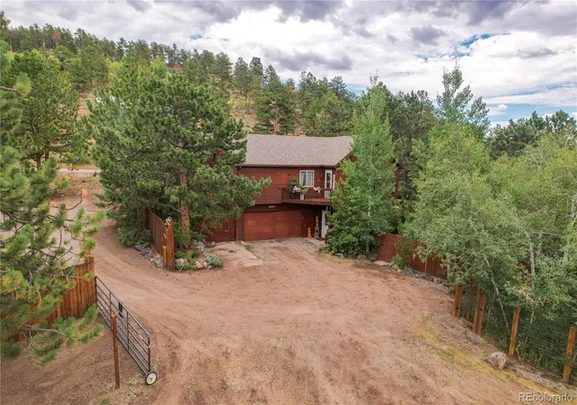 Photo 2 of Single family home for sale at 13851 Pine Valley Rd, Pine, CO 80470 | MLS# 8510245 | Listing updated on 2026-09-27