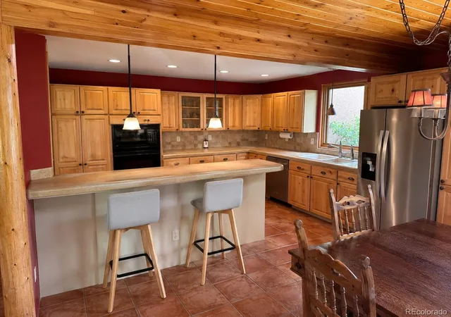 Photo 4 of Single family home for sale at 945 Oxford Ln, Colorado Springs, CO 80905 | MLS# 5055422 | Listing updated on 2026-09-04