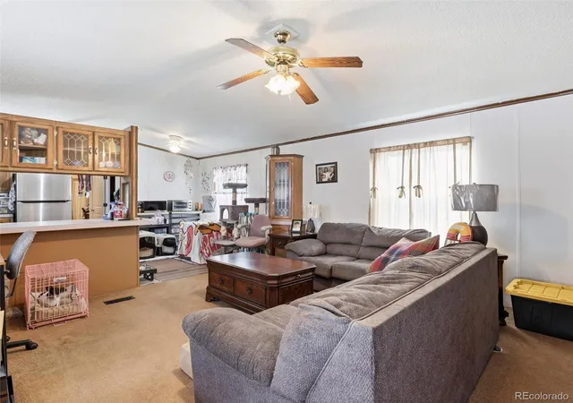 Photo 2 of Manufactured home for sale at 1570 Sedalia Way, Aurora, CO 80011 | MLS# 5766122 | Listing updated on 2026-09-14
