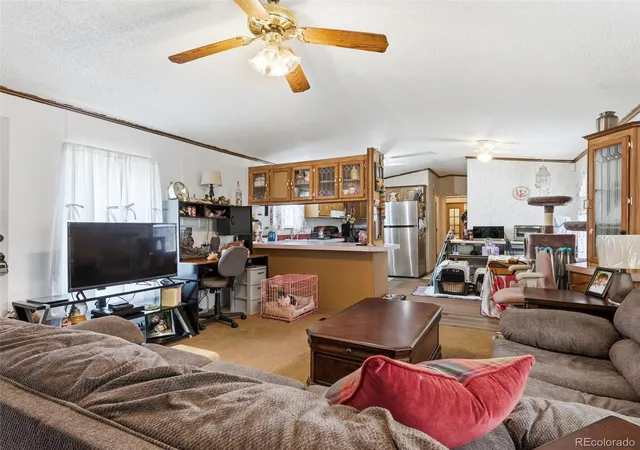 Photo 3 of Manufactured home for sale at 1570 Sedalia Way, Aurora, CO 80011 | MLS# 5766122 | Listing updated on 2026-09-14