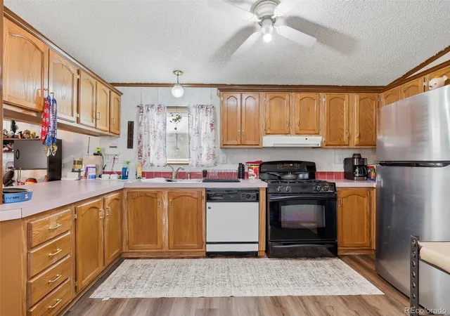 Photo 4 of Manufactured home for sale at 1570 Sedalia Way, Aurora, CO 80011 | MLS# 5766122 | Listing updated on 2026-09-14