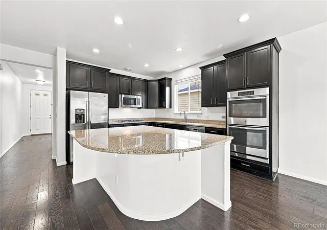 5th image of 10790 Unity Pkwy, Commerce City, CO 80022 | MLS# 3946363