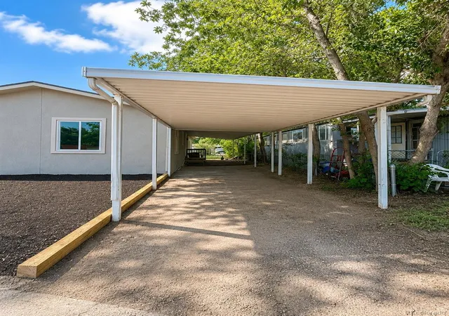 Photo 3 of Manufactured home for sale at 4825 Astrozon Blvd, Colorado Springs, CO 80916 | MLS# 9547472 | Listing updated on 2026-09-28