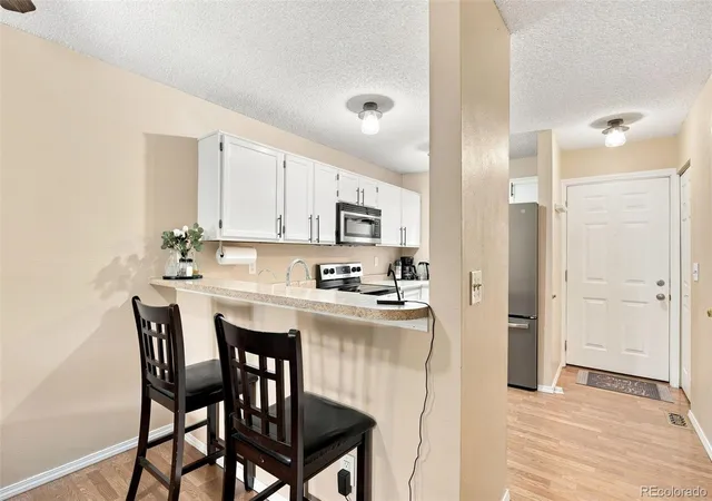 Photo 3 of Townhouse for sale at 3536 S Depew St #6, Denver, CO 80235 | MLS# 7979657 | Listing updated on 2026-09-19