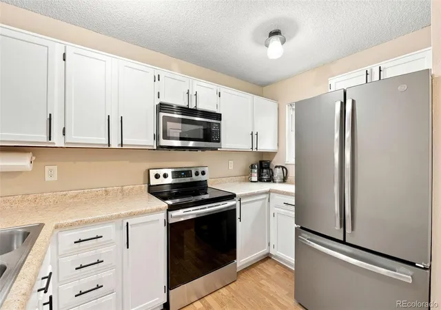 Photo 4 of Townhouse for sale at 3536 S Depew St #6, Denver, CO 80235 | MLS# 7979657 | Listing updated on 2026-09-19
