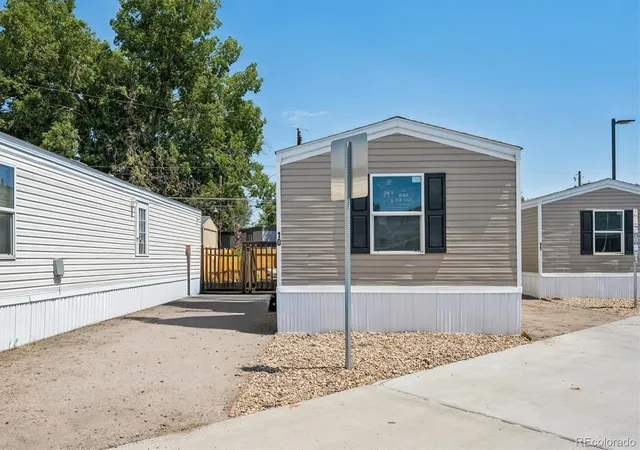 image of 5971 E 69th Ave, Commerce City, CO 80022 | MLS# 2111867