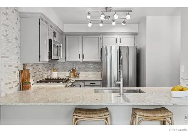 Photo 1 of Townhouse for sale at 2892 W Long Cir #G, Littleton, CO 80120 | MLS# IR1064746 | Listing updated on 2026-08-11