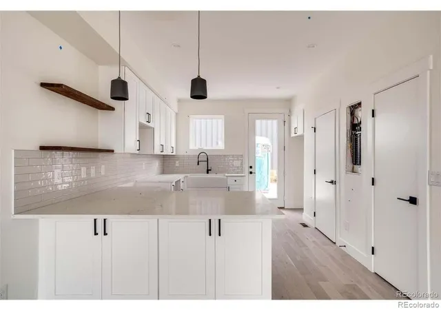 Photo 2 of Townhouse for sale at 1917 W Elk Pl #1, Denver, CO 80211 | MLS# 5544953 | Listing updated on 2026-10-10