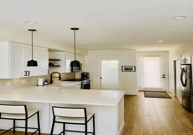 Photo 3 of Townhouse for sale at 1917 W Elk Pl #1, Denver, CO 80211 | MLS# 5544953 | Listing updated on 2026-10-10