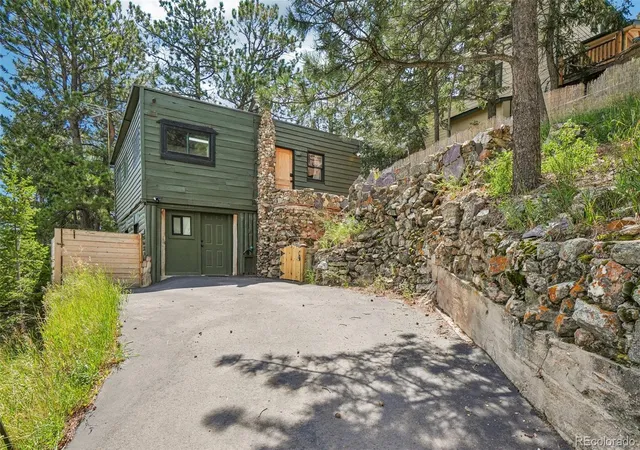 Photo 3 of Single family home for sale at 29980 Fir Dr, Evergreen, CO 80439 | MLS# 8778003 | Listing updated on 2026-10-06