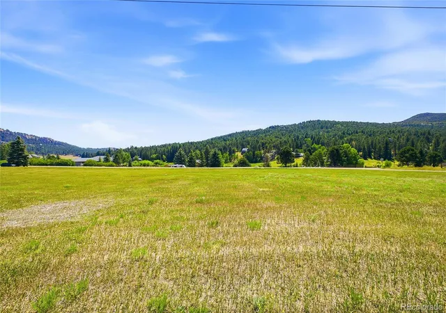 Photo 2 of Land for sale at 7665 Malamute Dr, Evergreen, CO 80439 | MLS# 8362793 | Listing updated on 2026-09-19
