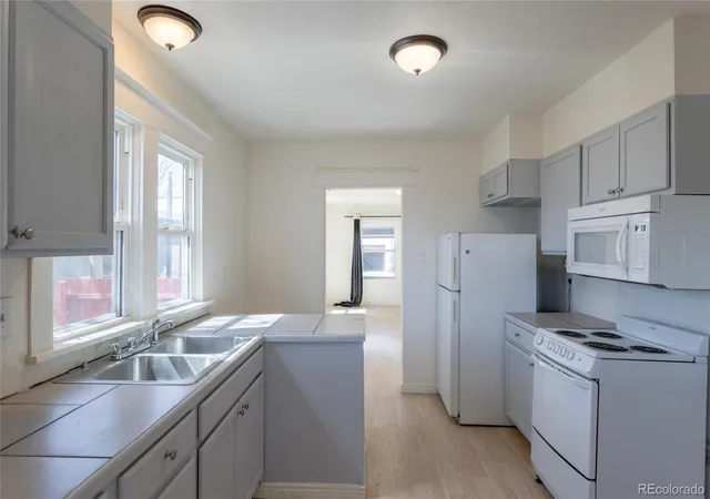Listing Photo 5 - Condo for sale in building located at 1508 Tamarac St, Denver, CO 80220