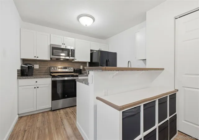 Photo 4 of Townhouse for sale at 1282 S Uvalda St, Aurora, CO 80012 | MLS# 4231541 | Listing updated on 2026-10-06