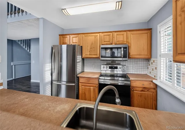 Photo 4 of Single family home for sale at 11521 E 1st Avenue, Aurora, CO 80010 | MLS# 4075070 | Listing updated on 2026-09-03