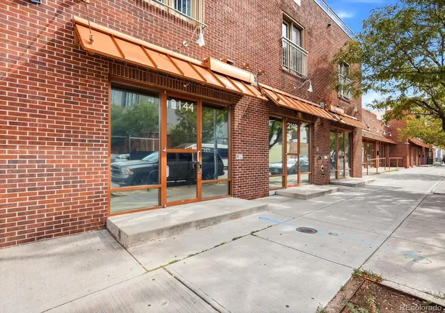 Listing Photo 3 - Condo for sale in building located at 2142 Curtis St, Denver, CO 80205 - Unit #102