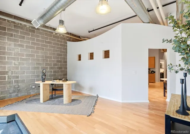 Listing Photo 4 - Condo for sale in building located at 2142 Curtis St, Denver, CO 80205 - Unit #102
